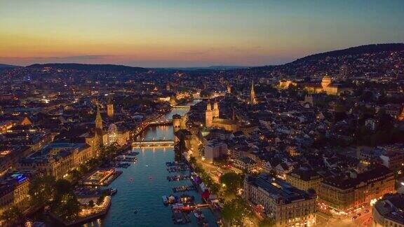 日落天空夜晚照亮飞行在苏黎世河畔空中全景4k时间间隔瑞士