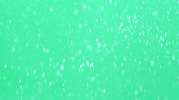 慢动作的水溅与滴在绿色屏幕色度键背景