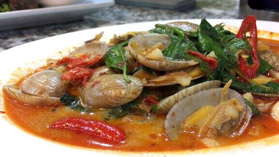 辣椒酱参巴蛤新加坡马来西亚海鲜在小贩食物中心