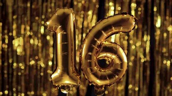 金色数字1616由一个充气气球制成以黄色为背景一组完整的数字生日、周年、日期
