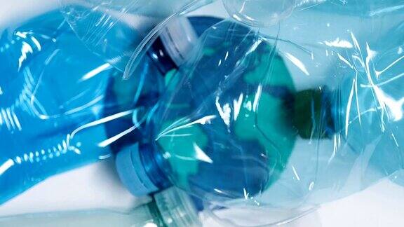塑料杯和塑料瓶从地球上消失的画面拯救地球