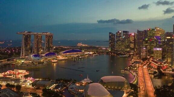 日落照明新加坡城市景观滨海湾市中心空中全景4k时间间隔