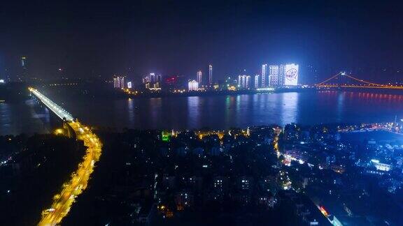 中国夜景时间照亮武汉市景市中心海湾航拍河滨全景4k时间流逝