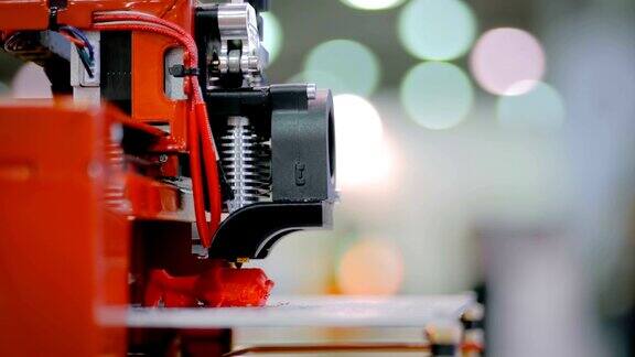 现代红色3D打印机打印塑料模型