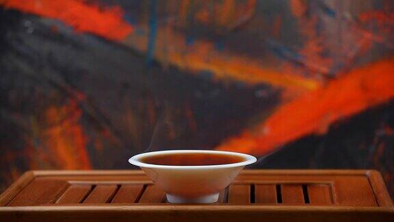 中国黑热茶杯竹桌高清录像