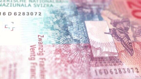 近距离跟踪多利拍摄1000200100502010瑞士法郎纸币观察和储备方4k分辨率股票视频-瑞士法郎当前20法郎钞票瑞士货币货币背景瑞士金融和经济状况