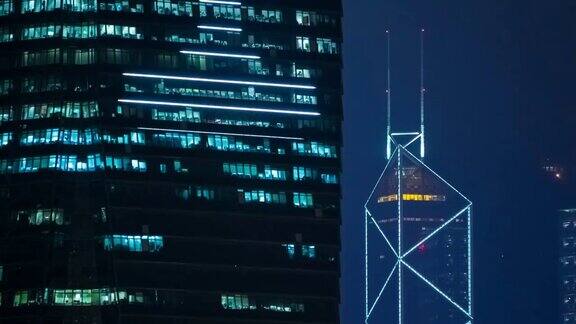 4K时间推移:香港摩天大楼城市和建筑公司的建筑工作到很晚香港-短片