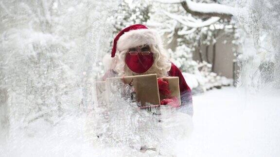 圣诞老人面具包裹礼品送货上门