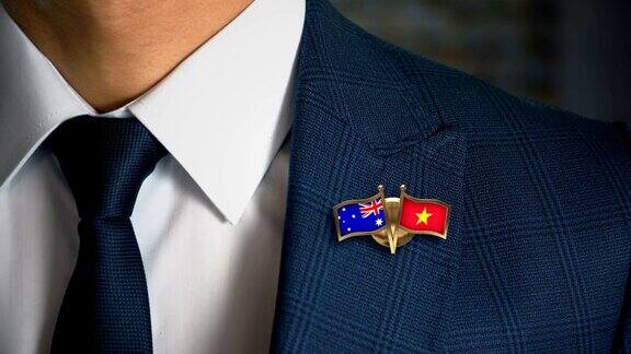 商人走向相机与朋友国家国旗别针澳大利亚-越南