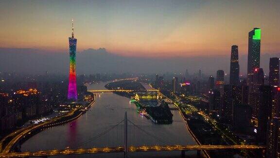 中国日落时间夜晚照明广州市中心城市景观珠江烈德桥空中全景4k时间