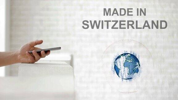 手发射地球全息图和瑞士制造文字