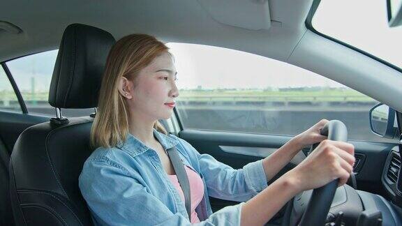 亚洲女商人驾驶汽车