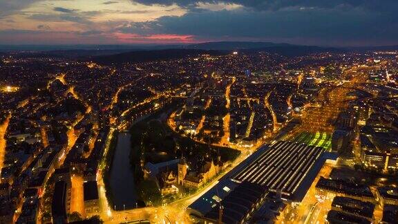 日落天空夜晚照亮苏黎世城市景观交通街道空中全景4k时间流逝瑞士