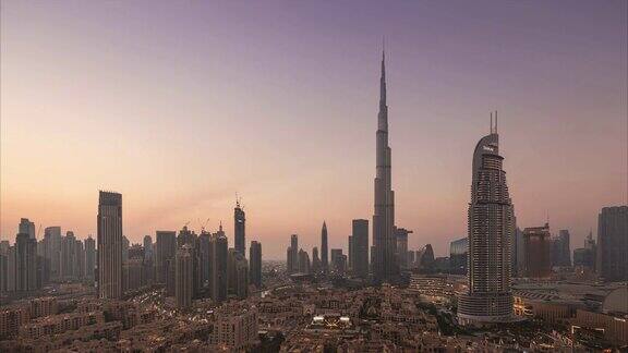 4K时间推移-城市和城市景观在日落在迪拜阿联酋