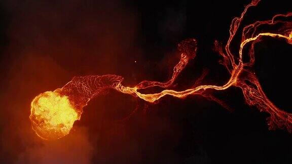 空中鸟瞰从上到下从火山口喷出的熔岩流令人惊叹的橙色纹理与Fagradalsfjall火山形成对比2021年冰岛