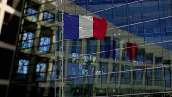 法国国旗飘扬在摩天大楼上