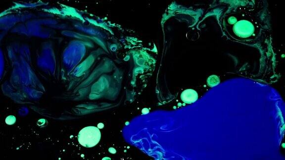 抽象彩色涂料反应迷幻液体光显示染料图案在水、油、颜料资料片大理石背景油墨爆炸万花筒或LSD效果