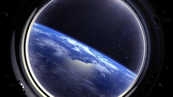 透过宇宙飞船的窗户看到的地球国际空间站向前飞现实的气氛体积云从空间星星闪烁空间、地球轨道