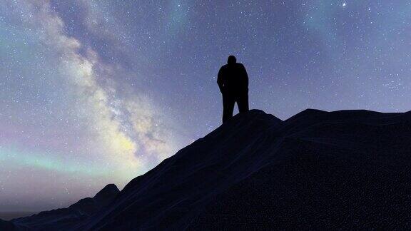成功的人站在山顶仰望星空