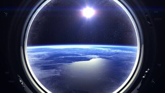 从国际空间站的窗口看到的地球国际空间站向右飞行现实的气氛体积云从空间星星闪烁空间地球太阳在窗户里