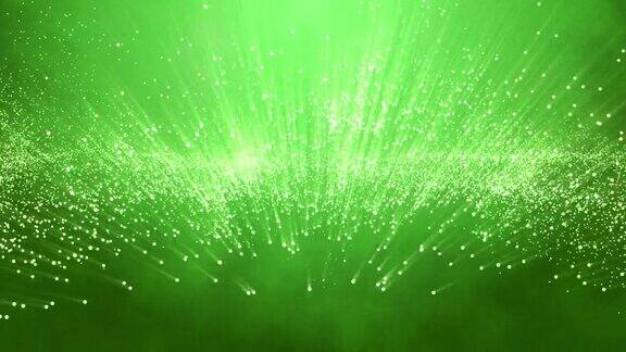 闪亮的粒子漂浮在绿色的背景上