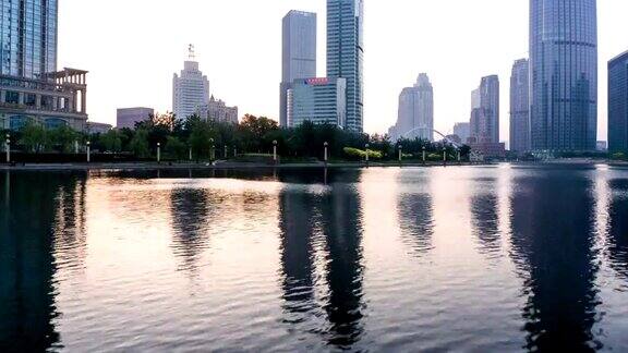 日出时分天津河边的和现代建筑