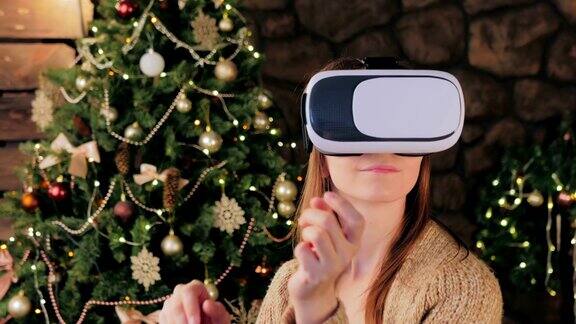 年轻女子使用虚拟现实眼镜