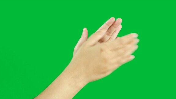 4k女人双手缓慢拍手掌声孤立在色度键绿色屏幕背景上