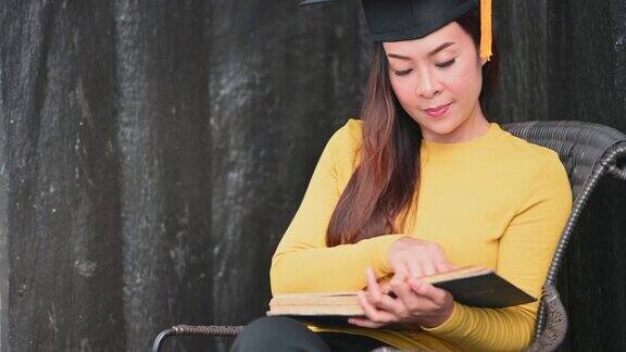 一个穿着黄色衬衫的女学生正在读书