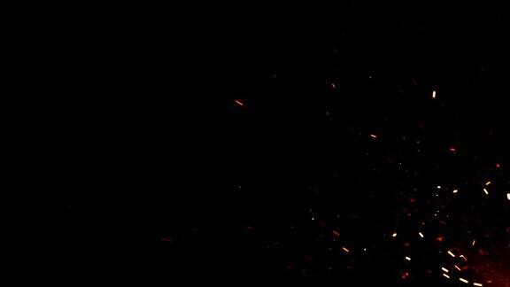 美丽的燃烧炽热的火花从夜空中的大火升起抽象孤立的火发光粒子在黑色背景飞行毛圈的3d动画从角落里