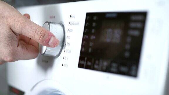 选择程序和启动洗衣机-4K分辨率