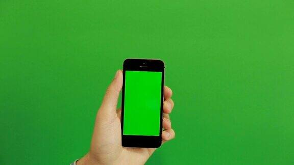绿色屏幕上的智能手机