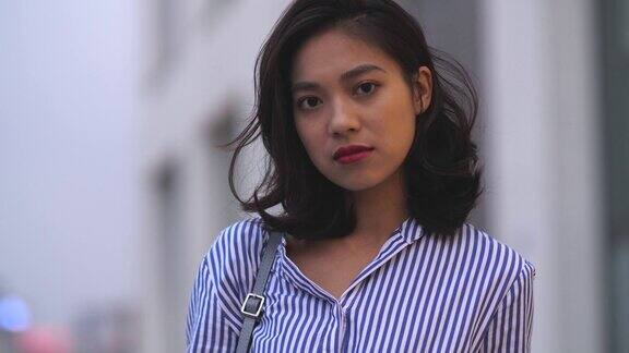 年轻亚洲女人的慢镜头4k