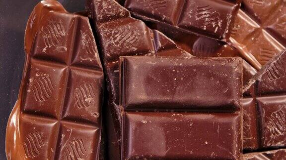巧克力甜巧克力块旋转靠近美食甜点成分糖果糖果纹理背景与美味的糖果慢动作