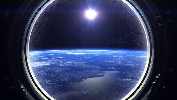 从国际空间站的窗口看到的地球国际空间站飞走了现实的气氛体积云从空间星星闪烁太空地球轨道太阳在窗口