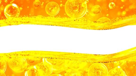 金色两波白色背景与泡沫金色液体项目油蜂蜜啤酒果汁或其他变种文本的位置
