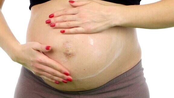 孕妇腹部奶油笑脸白色特写