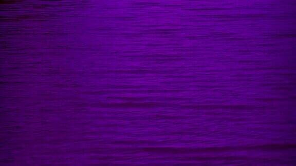抽象模糊的紫色平静移动波背景纹理