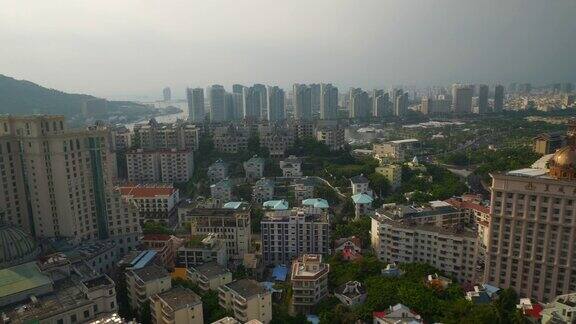 日落时间晴天三亚城市景观酒店屋顶全景4k海南中国