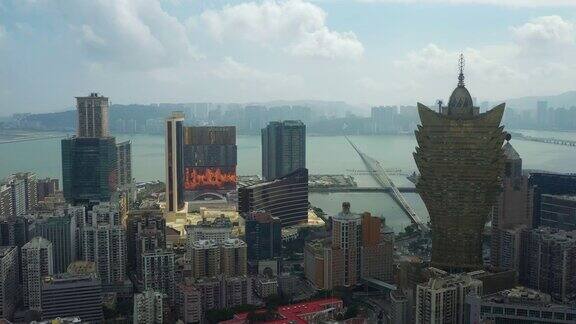 阳光明媚的一天澳门城市风光市中心著名酒店航拍全景4k中国