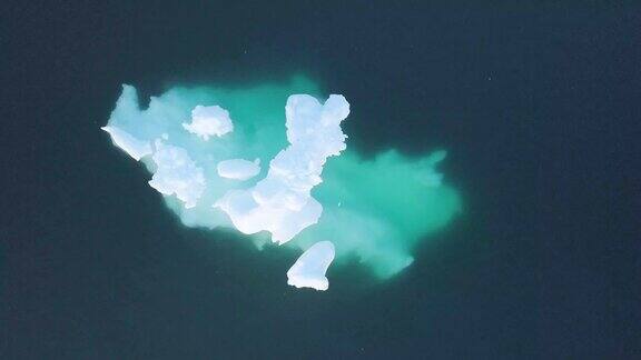 冰山无人机航拍视频俯视图-气候变化和全球变暖-冰山融化冰川在伊卢利萨特格陵兰岛的冰峡湾联合国教科文组织世界遗产的北极自然冰景观