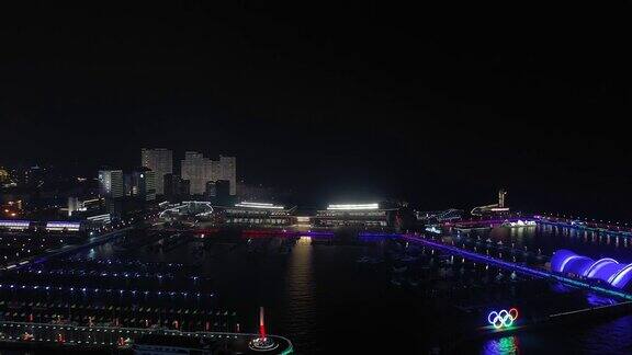 夜间时间青岛市区著名的奥林匹克湾码头航拍4k中国全景图