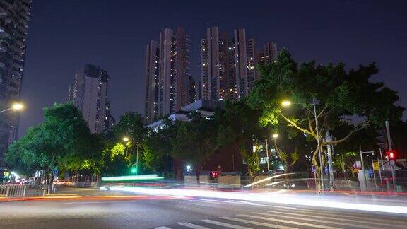 夜间时间广州城市公寓综合体交通街道十字路口时间推移全景4k中国