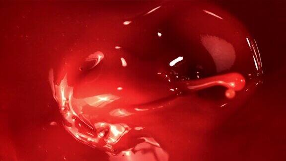 超级慢动作新鲜番茄汁宏观背景用高速摄像机以每秒1000帧的速度拍摄