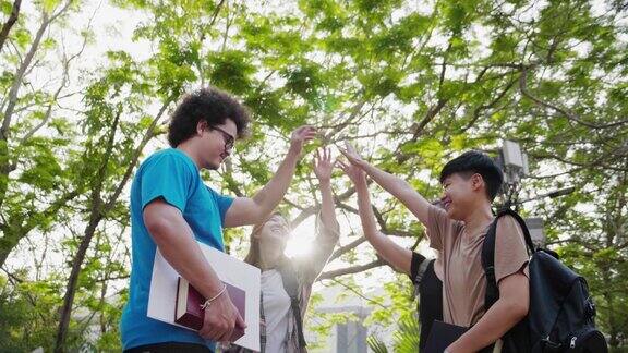 亚洲学生朋友在大学里互相问候教育和学生