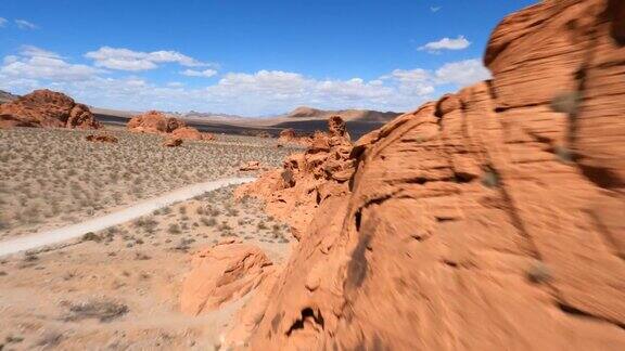 飞行彩色岩石沙漠峡谷FPV无人机速度快的视角