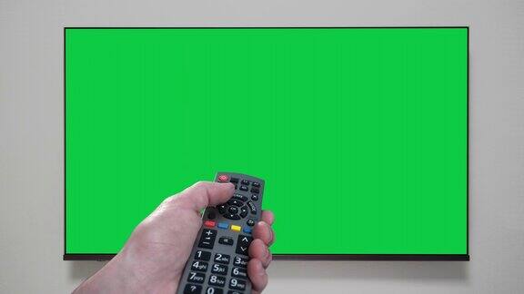 4K-手持遥控器改变频道电视绿色的屏幕色度键