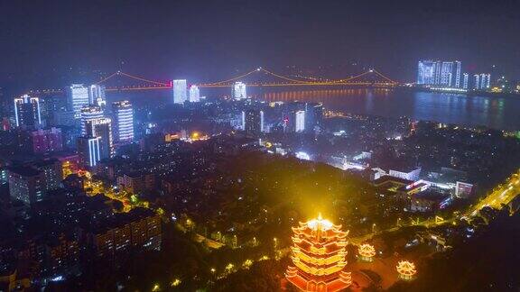 中国夜景时间照亮武汉著名的黄鹤寺空中河滨全景4k时间流逝
