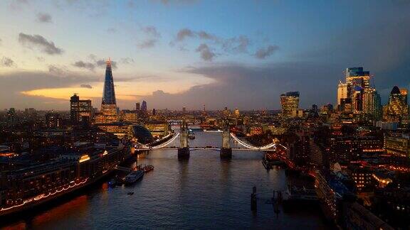 鸟瞰伦敦的碎片大厦塔桥和泰晤士河在黄昏-4k视频