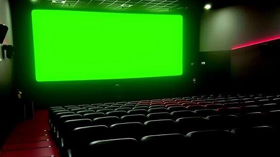电影院内部设有红色空座色彩键上有拷贝空间绿色屏幕边缘发光是一种娱乐
